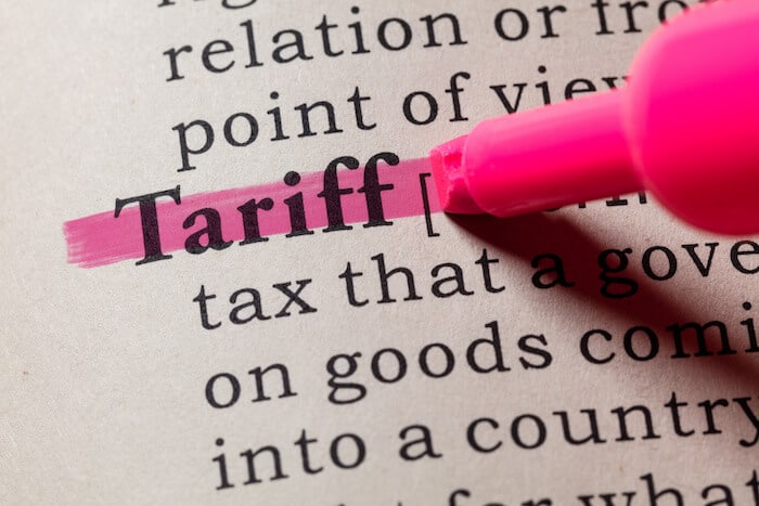 The word Tariff in a dictionary, highlighted in pink