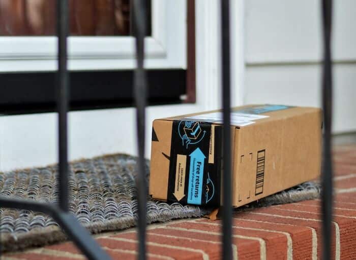 Amazon listing optimization: Amazon box on front door mat