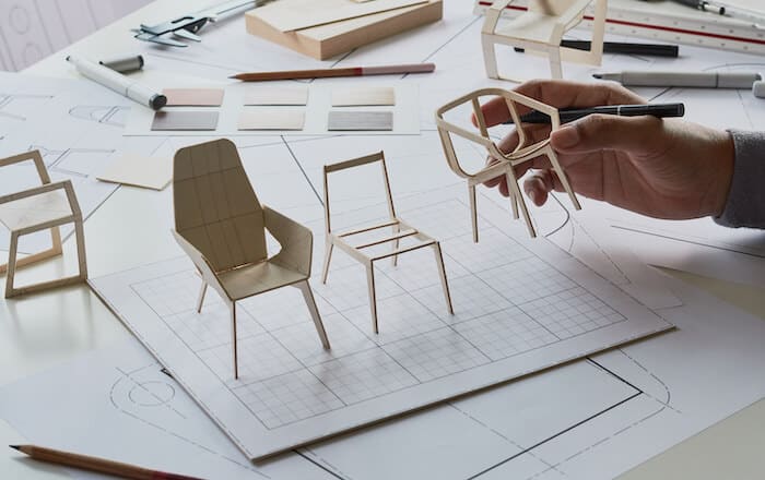 How to manufacture a product and sell it: designer building prototypes of chairs