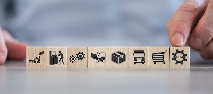 Supply chain illustrated in wooden block icons