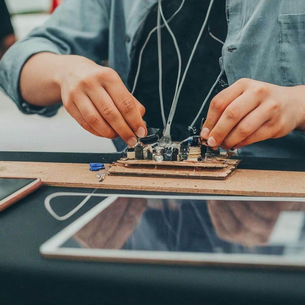 Man building an electronic prototype.