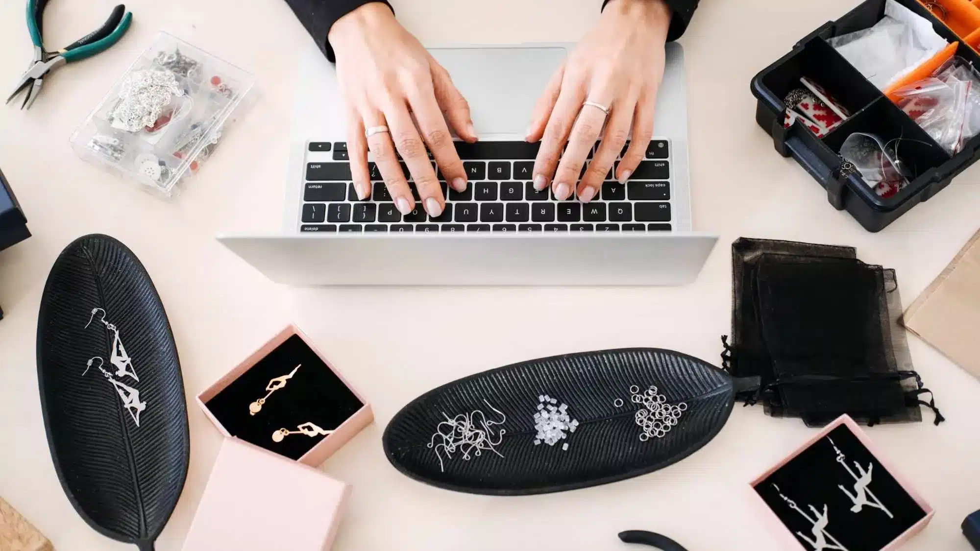 Go-to-market strategy Etsy shown through a seller planning and creating handmade products at a work desk.