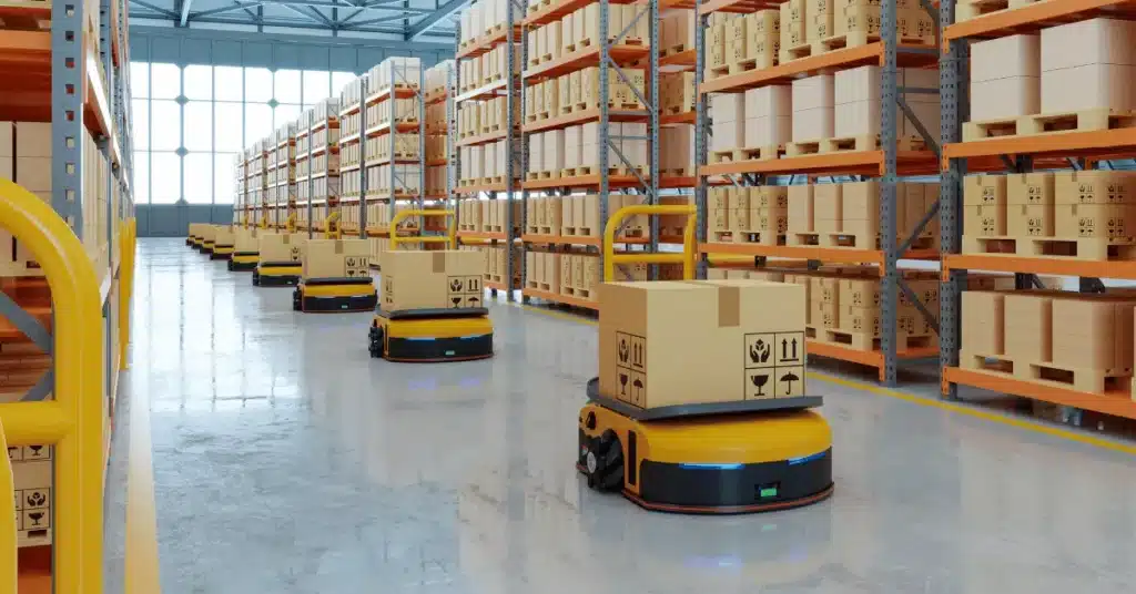 Fulfillment center vs warehouse automation with robotic systems moving packages through a modern fulfillment center distribution floor