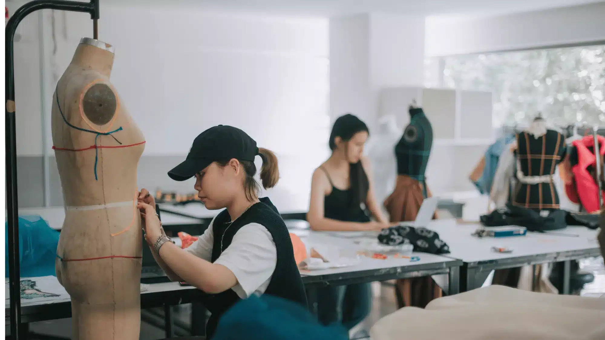 fashion product manufacturing and garment prototyping process in design studio with dress form