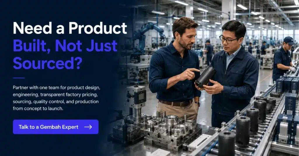 Gembah manufacturing partners inspect a product on a factory floor, highlighting product development beyond basic sourcing.