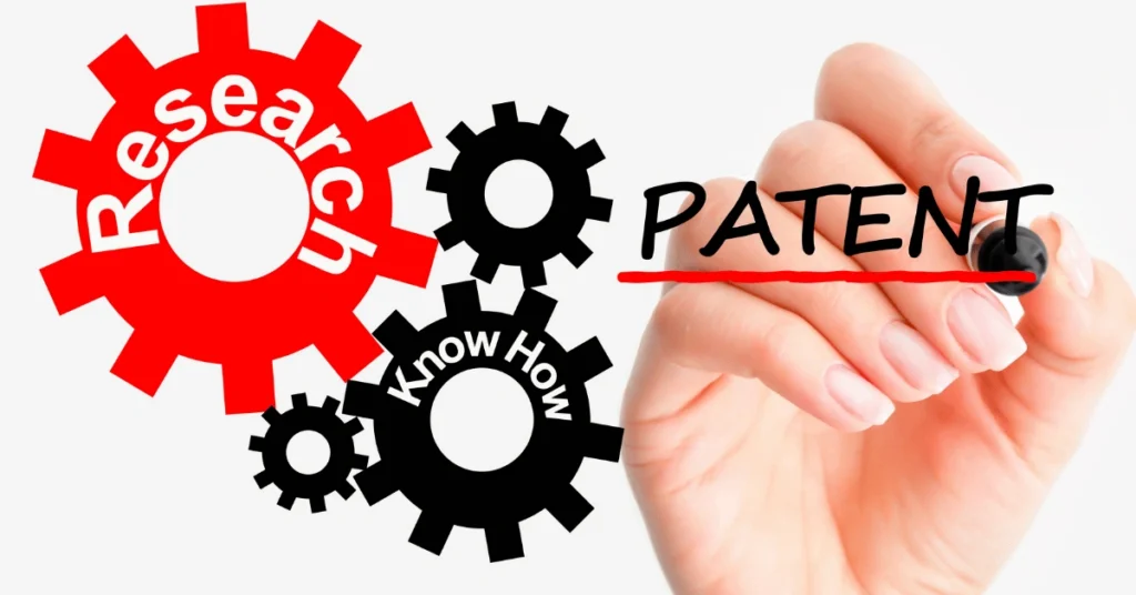 Patent research graphic showing gears, patent text, and a hand writing as part of the invention review process.