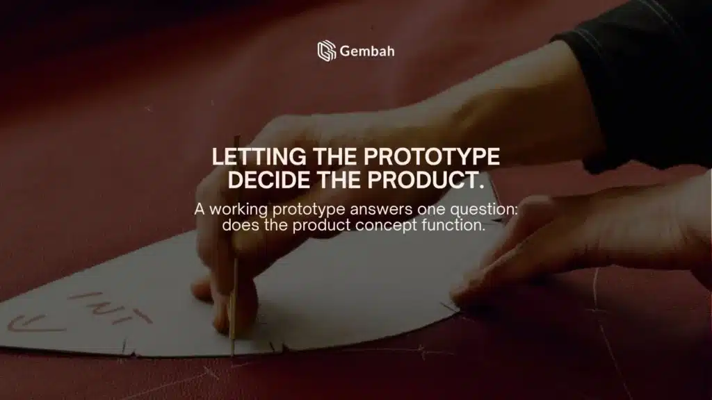 Hands cutting a leather pattern, illustrating the mistake of letting the prototype decide the product